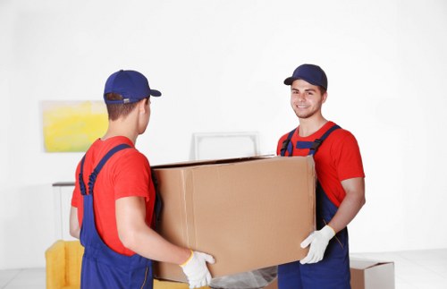 Boxes and small furniture prepared for a Marylebone student move