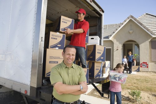 Local movers preparing fragile items for packing in Marylebone