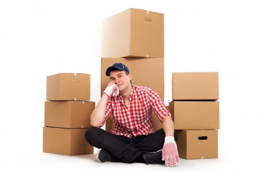 Careful movers transporting furniture in central London